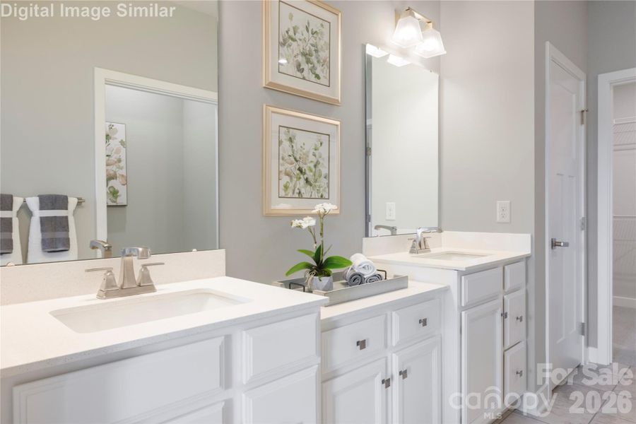 Wake up and step into luxury—your main-level primary bedroom offers direct access to a spa-inspired bath and the open-concept living space beyond. No stairs, no barriers—just seamless flow, effortless comfort, and everyday elegance. It’s the kind of layout that turns routines into rituals.