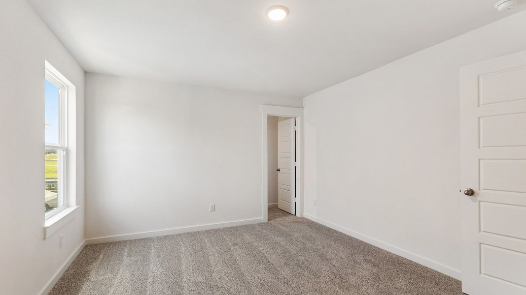 Furnished interior view inside a new home in Mostyn Springs, Magnolia (Image 22).
