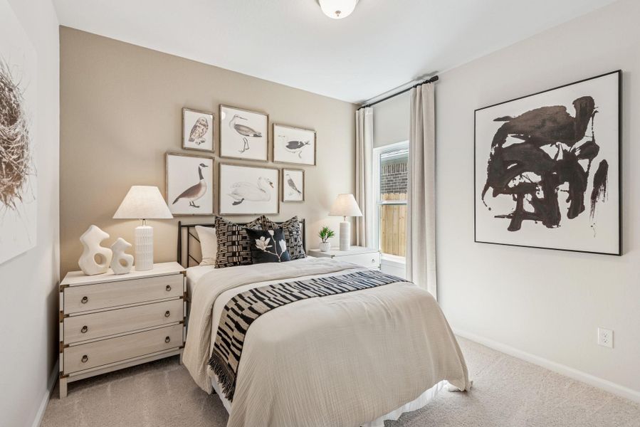 Secondary Bedroom. Staged model home shown for illustration only; actual features, colors, and upgrades may vary.