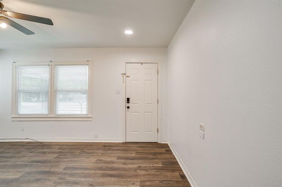 Entrance with dark wood finished floors, recessed lighting, and ceiling fan
