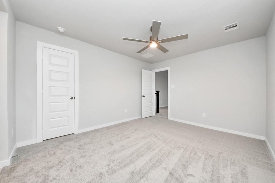 Generously sized secondary bedrooms featuring spacious closets, soft and inviting carpeting underfoot, large windows allowing plenty of natural light, and the added touch of privacy blinds for your personal retreat. Sample photo of completed home with similar floor plan. Actual colors and selections may vary. Generously sized secondary bedrooms featuring spacious closets, soft and inviting carpeting underfoot, large windows allowing plenty of natural light, and the added touch of privacy blinds for your personal retreat. Sample photo of completed home with similar floor plan. Actual colors and selections may vary.