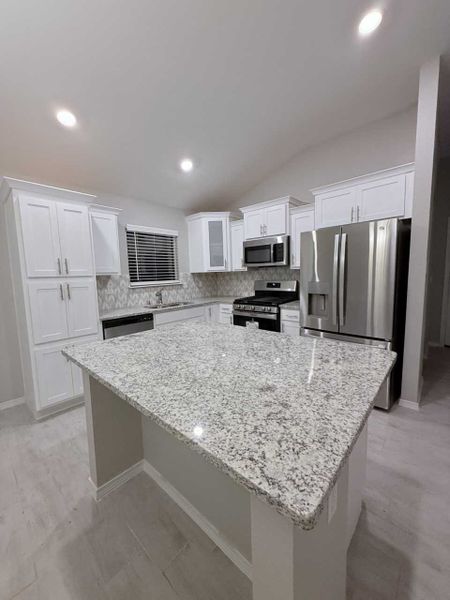 Representative furnished interior of a home built from the Madison 1487 SSC by Saratoga Homes in Crossland, El Paso (Image 6).