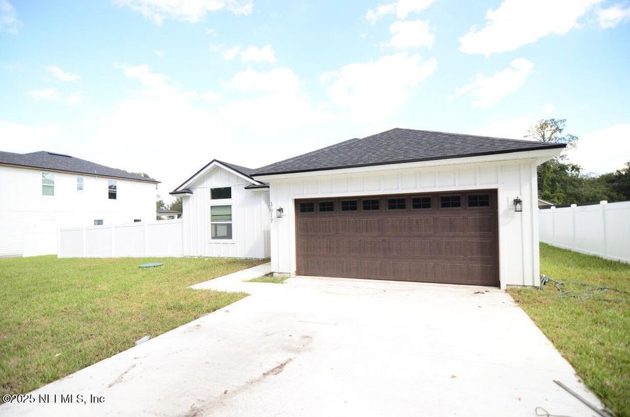 Front exterior of a new home in , Jacksonville, FL, highlighting curb appeal (Image 2). Front exterior of a new home in , Jacksonville, FL, highlighting curb appeal (Image 2).