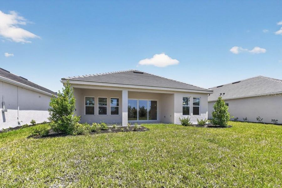 Exterior details and patio area of a home in Skye Ranch Community Group Page, Sarasota (Image 3).