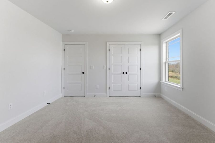 Spacious, unfurnished interior of a new home in Blacksmith, Stokesdale (Image 92).