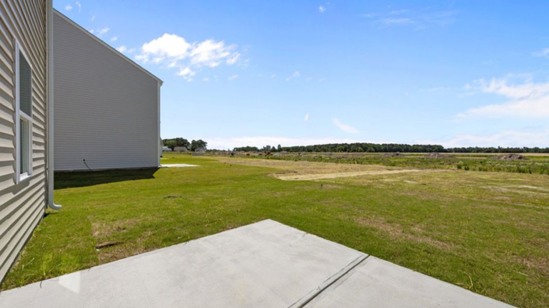 Exterior details and patio area of a home in East Ridge, Ayden (Image 4).
