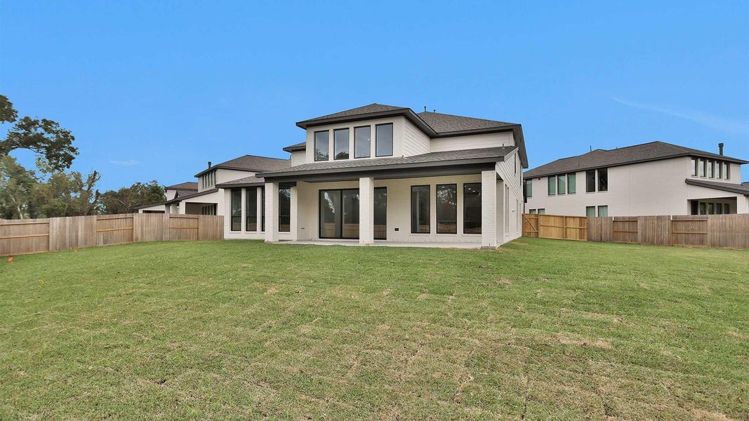 Exterior details and patio area of a home in Sienna 55' - Valencia, Missouri City (Image 2). Exterior details and patio area of a home in Sienna 55' - Valencia, Missouri City (Image 2).