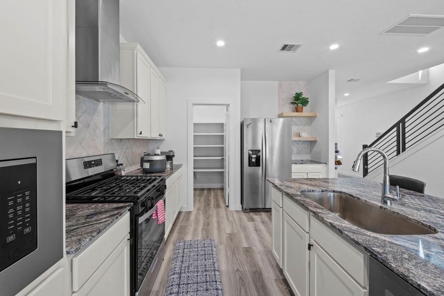 Kitchen to walk in pantry Kitchen to walk in pantry