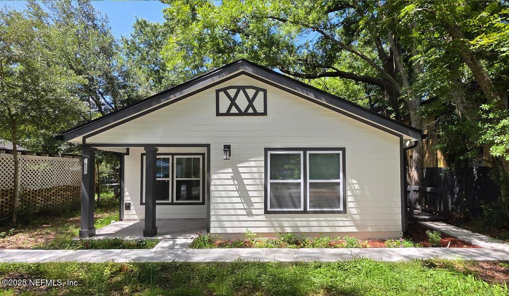 Front exterior of a new home in , Jacksonville, FL, highlighting curb appeal (Image 1). Front exterior of a new home in , Jacksonville, FL, highlighting curb appeal (Image 1).