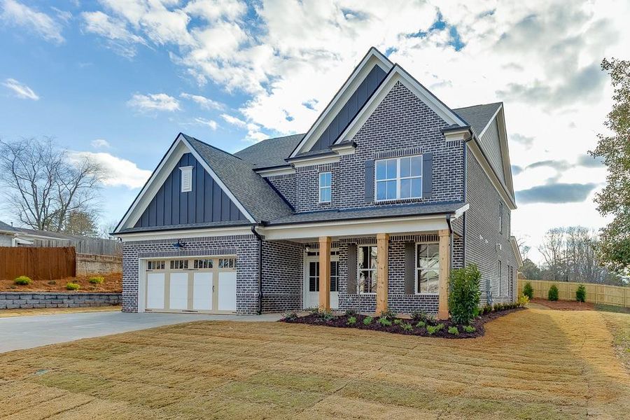 Front exterior of a new home in , Buford, GA, highlighting curb appeal (Image 1). Front exterior of a new home in , Buford, GA, highlighting curb appeal (Image 1).