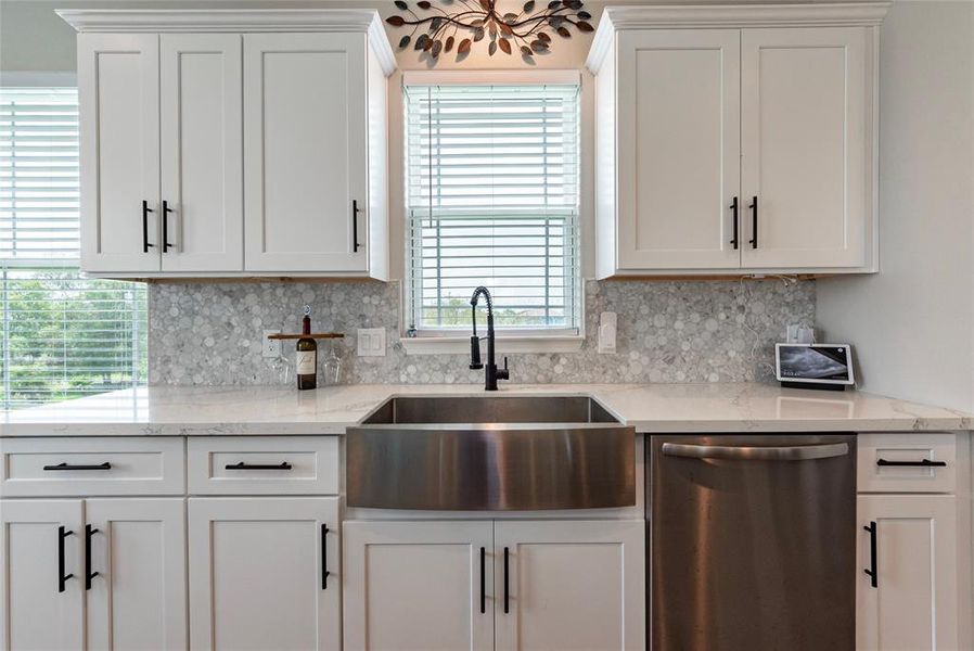 Farm house sink with plenty of counter space with under counter lighting