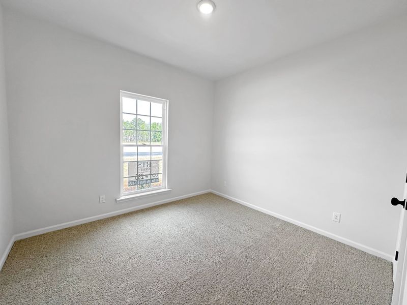 Spacious, unfurnished interior of a new home in Doctor's Creek, Ludowici (Image 19).