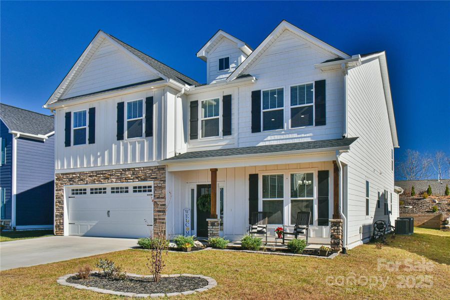 Front exterior of a new home in , Fletcher, NC, highlighting curb appeal (Image 1). Front exterior of a new home in , Fletcher, NC, highlighting curb appeal (Image 1).