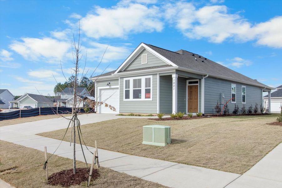 Front exterior of a new home in Tillery Park, Grovetown, GA, highlighting curb appeal (Image 23). Front exterior of a new home in Tillery Park, Grovetown, GA, highlighting curb appeal (Image 23).