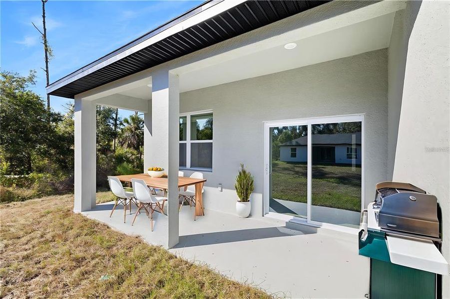 Exterior details and patio area of a home in , Port Charlotte (Image 3).