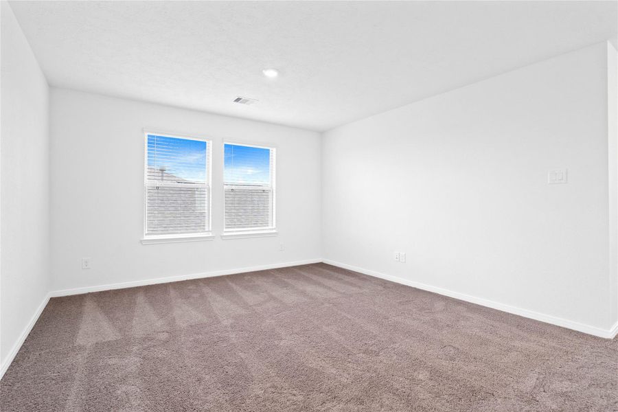 Enjoy the Loft—an additional living area perfect for a game room, media space, or a peaceful retreat. Featuring, recessed lighting, large windows with privacy blinds, and plush carpeting.