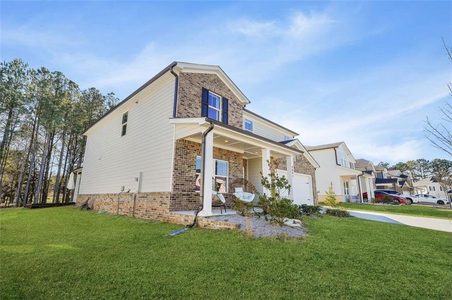 Exterior details and patio area of a home in , Loganville (Image 3).