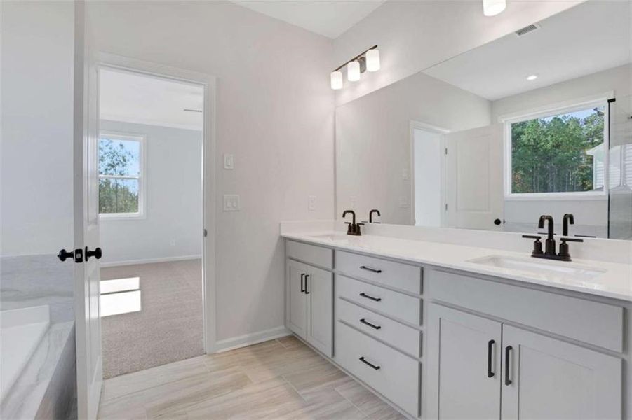 Furnished interior view inside a new home in The Paddocks at Doc Hughes, Buford (Image 11).