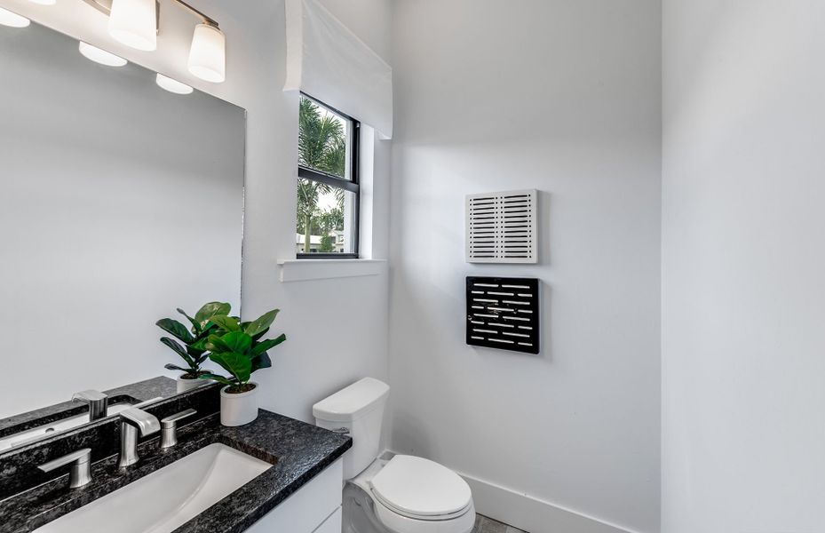 Representative furnished interior of a home built from the Layton by DiVosta in Terreno, Naples (Image 32).