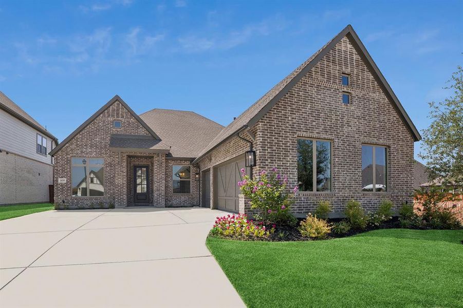 Front exterior of a new home in Terraces – Classics, Rockwall, TX, highlighting curb appeal (Image 1). Front exterior of a new home in Terraces – Classics, Rockwall, TX, highlighting curb appeal (Image 1).