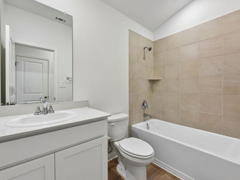 Furnished interior view inside a new home in Butler Farms - Reserve Collection, Liberty Hill (Image 7).