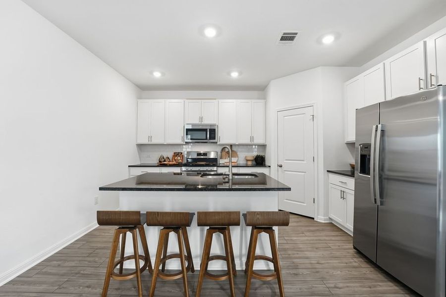 Furnished interior view inside a new home in Longview, Del Valle (Image 4).