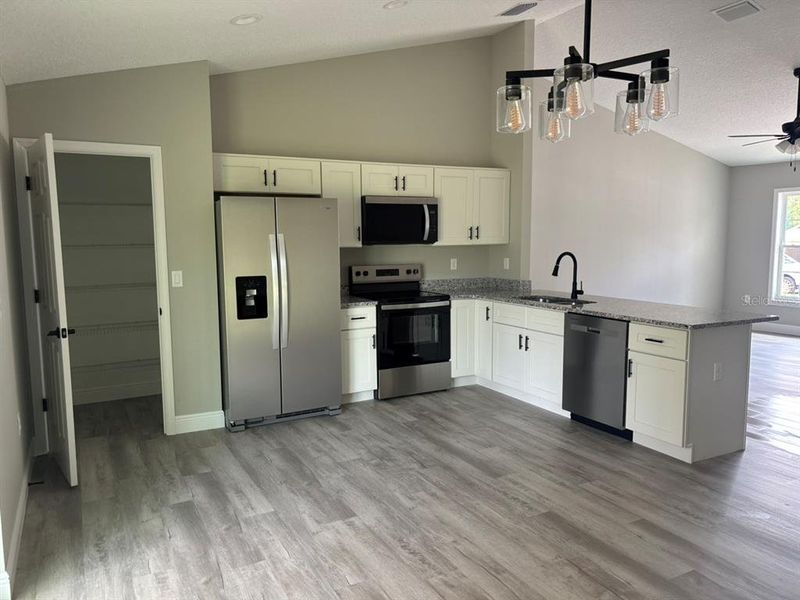 Furnished interior view inside a new home in , Dunnellon (Image 9).