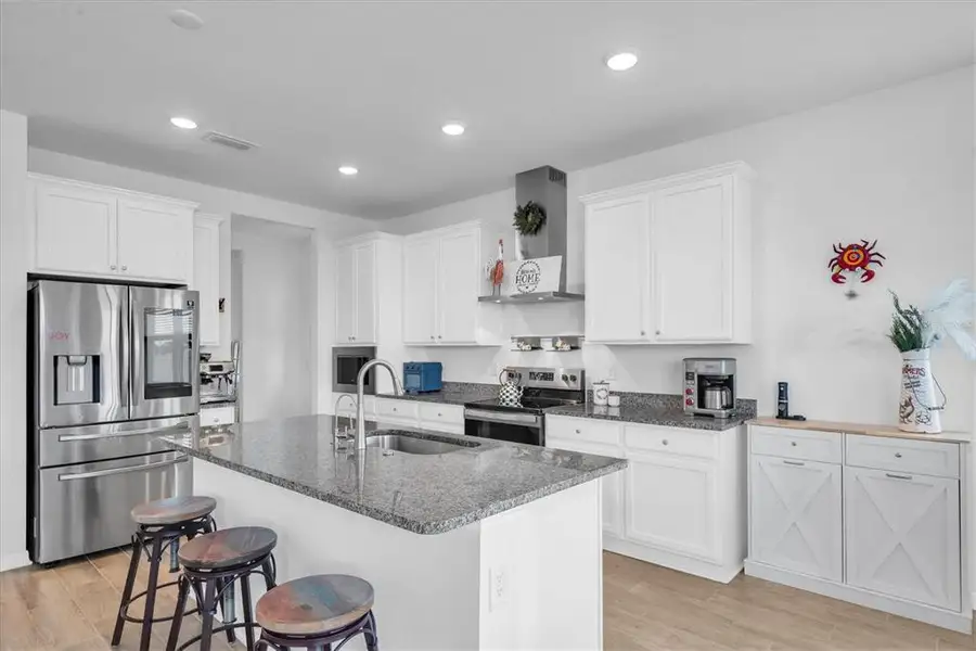 Furnished interior view inside a new home in Hilltop Point, Dade City (Image 7).