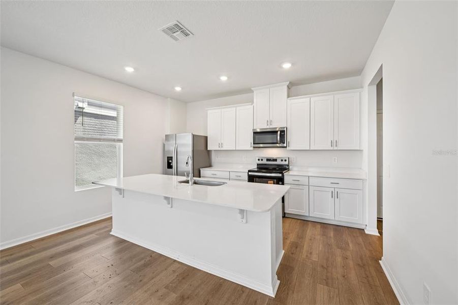 Furnished interior view inside a new home in The Meadow at Crossprairie Bungalows, St. Cloud (Image 8).
