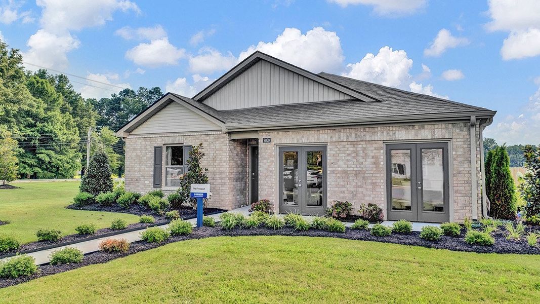 Front exterior of a new home in Huntington Estates, Millington, TN, highlighting curb appeal (Image 18).
