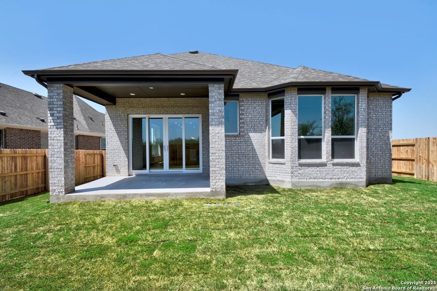 Front exterior of a new home in Homestead, Schertz, TX, highlighting curb appeal (Image 2).