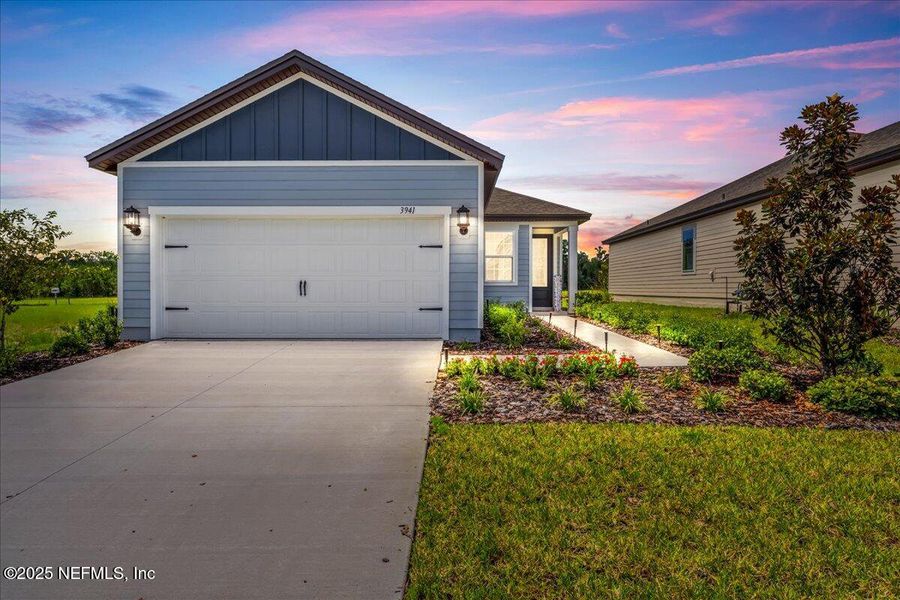 Front exterior of a new home in Jennings Farm, Middleburg, FL, highlighting curb appeal (Image 24). Front exterior of a new home in Jennings Farm, Middleburg, FL, highlighting curb appeal (Image 24).