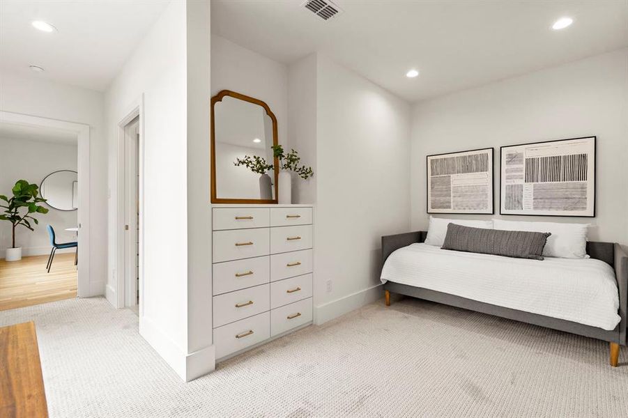 Bedroom with light colored carpet and recessed lighting Bedroom with light colored carpet and recessed lighting