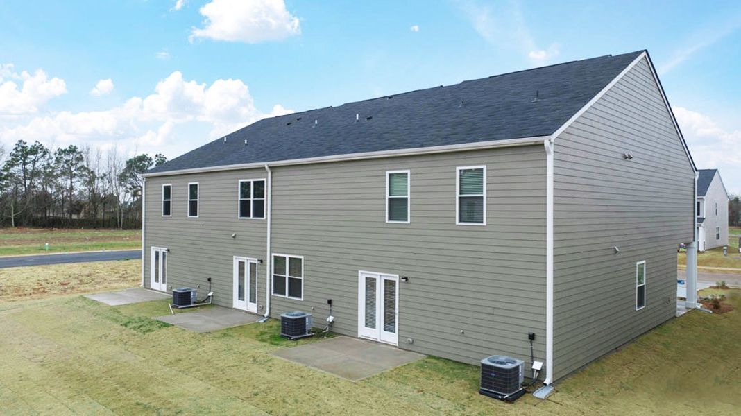 Exterior details and patio area of a home in Laurel Park Townhomes, Hephzibah (Image 4).