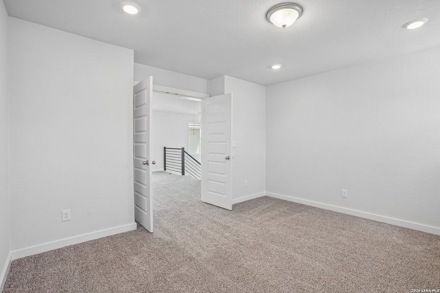 Spacious, unfurnished interior of a new home in August Fields, New Braunfels (Image 34).