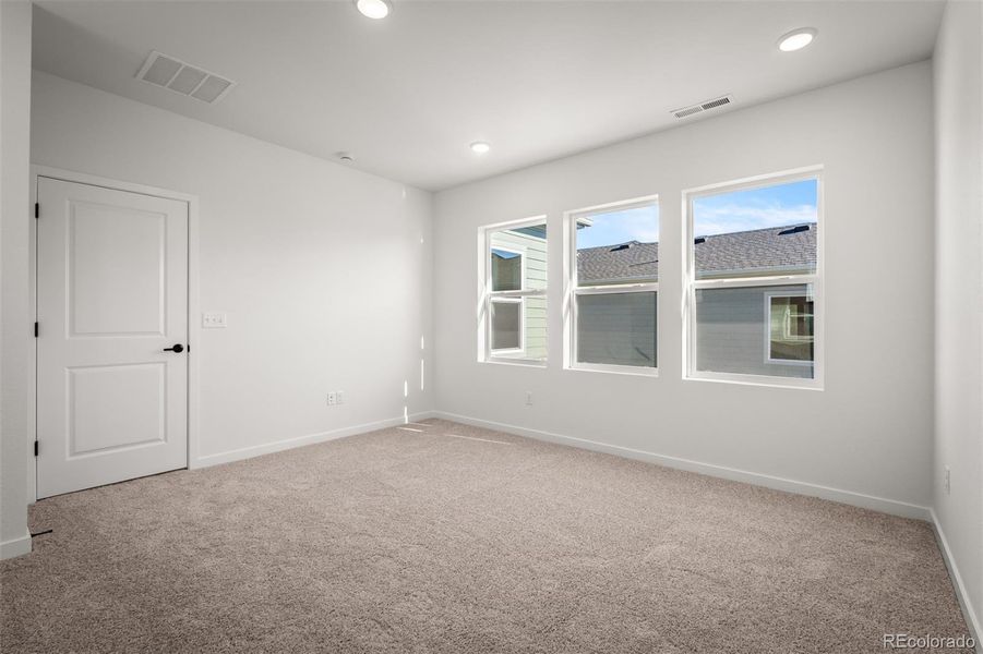 Spacious, unfurnished interior of a new home in Revel Crossing at Wolf Ranch – The Outlook Collection, Colorado Springs (Image 37).