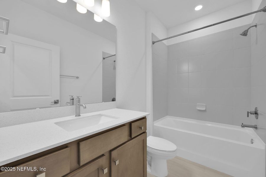 Furnished interior view inside a new home in Bradley Creek, Green Cove Springs (Image 9).