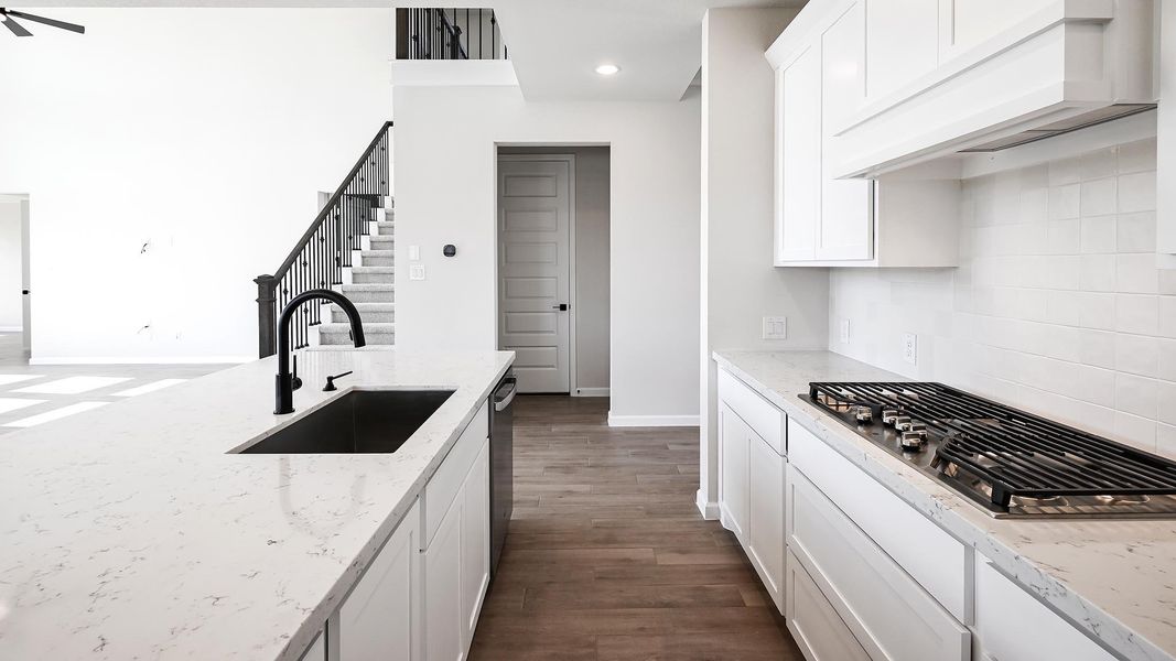 Furnished interior view inside a new home in 6 Creeks, Kyle (Image 12).