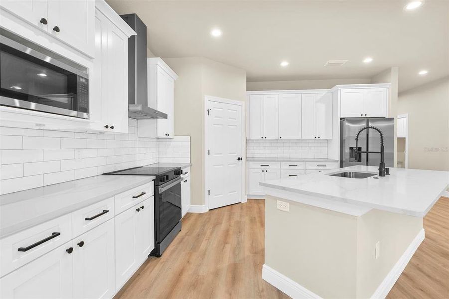 Furnished interior view inside a new home in , Weeki Wachee (Image 5). Furnished interior view inside a new home in , Weeki Wachee (Image 5).