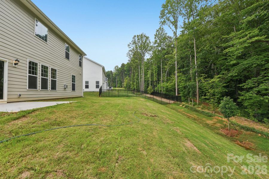 Exterior details and patio area of a home in Falls Cove, Troutman (Image 19). Exterior details and patio area of a home in Falls Cove, Troutman (Image 19).