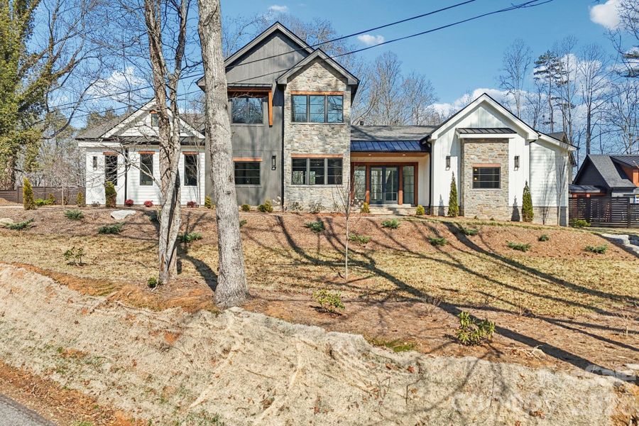 Front exterior of a new home in , Brevard, NC, highlighting curb appeal (Image 25).