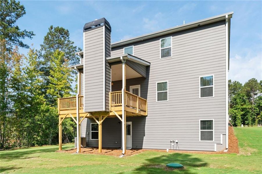 Exterior details and patio area of a home in The Woodlands Preserve, Jackson (Image 18).