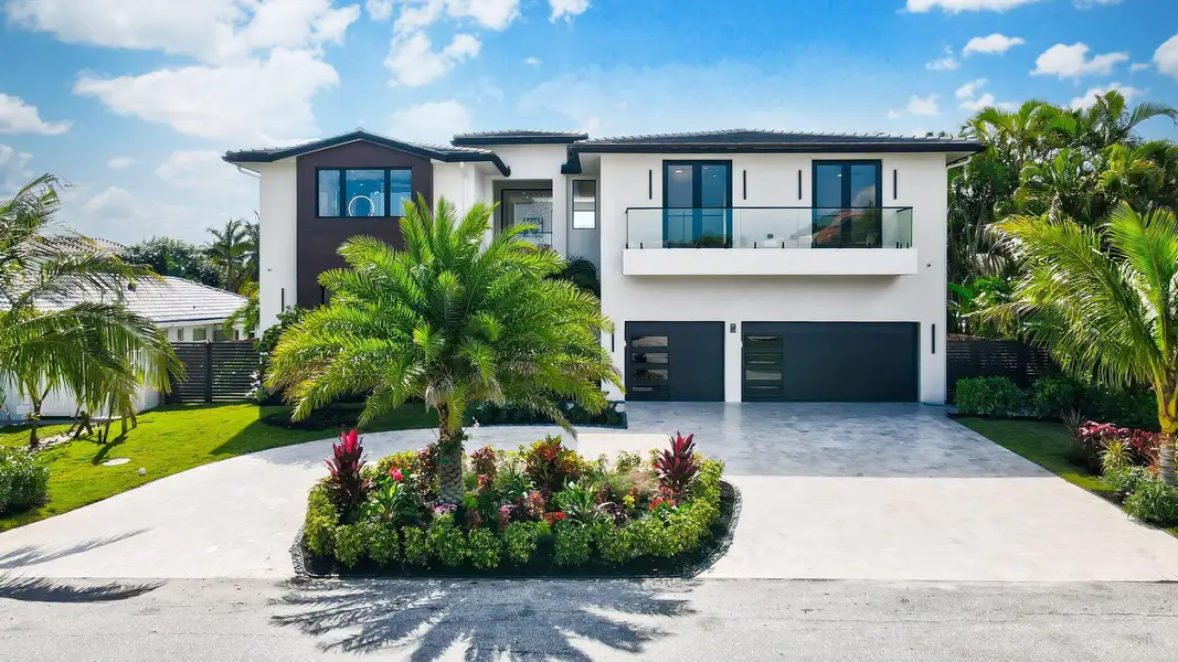 Front exterior of a new home in , Boca Raton, FL, highlighting curb appeal (Image 1). Front exterior of a new home in , Boca Raton, FL, highlighting curb appeal (Image 1).