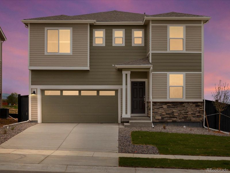 Front exterior of a new home in Westgate, Greeley, CO, highlighting curb appeal (Image 2). Front exterior of a new home in Westgate, Greeley, CO, highlighting curb appeal (Image 2).