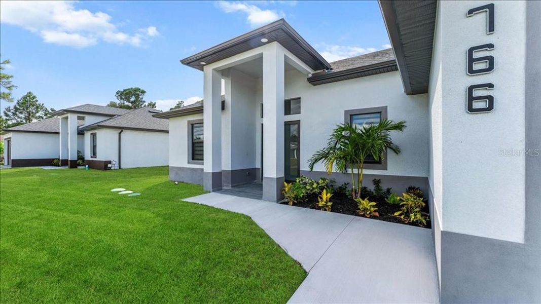 Exterior details and patio area of a home in , Lehigh Acres (Image 30).