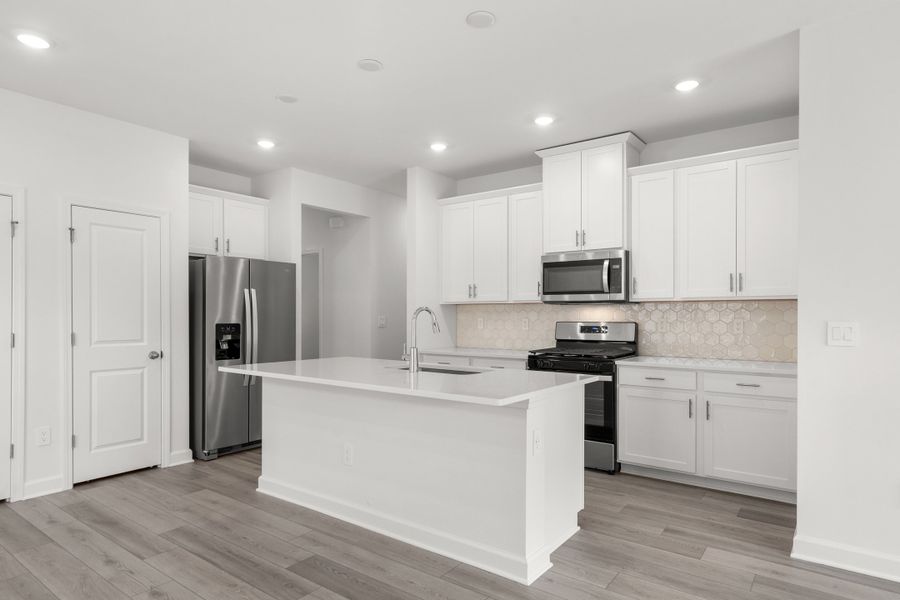 Furnished interior view inside a new home in Cypress Ridge - The Boardwalk Series, Longs (Image 4).