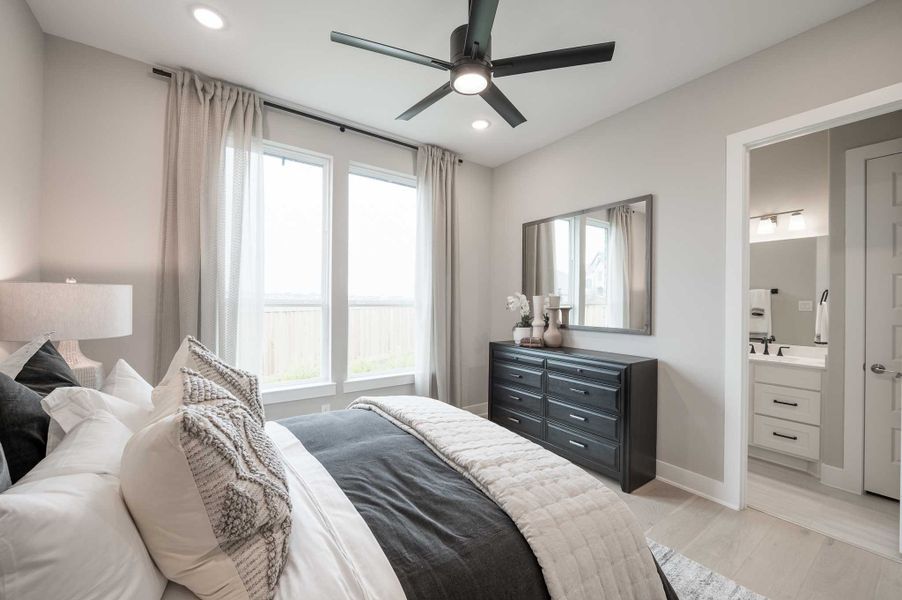 Representative furnished interior of a home built from the Milan by Tri Pointe Homes in Dunham Pointe, Cypress (Image 79).