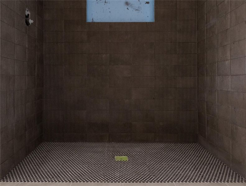 Secondary Bathroom tile on Unit B/C. Progress as of 4/15/26.