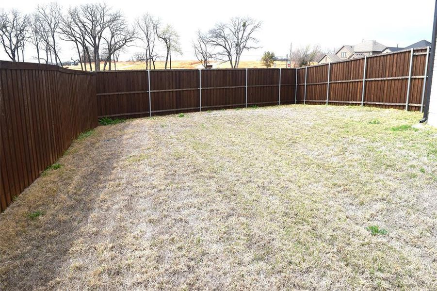Exterior details and patio area of a home in , Hickory Creek (Image 29).
