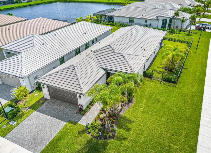 Front exterior of a new home in , Port St. Lucie, FL, highlighting curb appeal (Image 2). Front exterior of a new home in , Port St. Lucie, FL, highlighting curb appeal (Image 2).